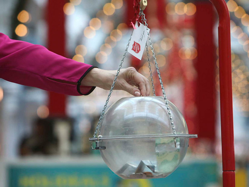 Donating to Salvation Army Christmas Kettle